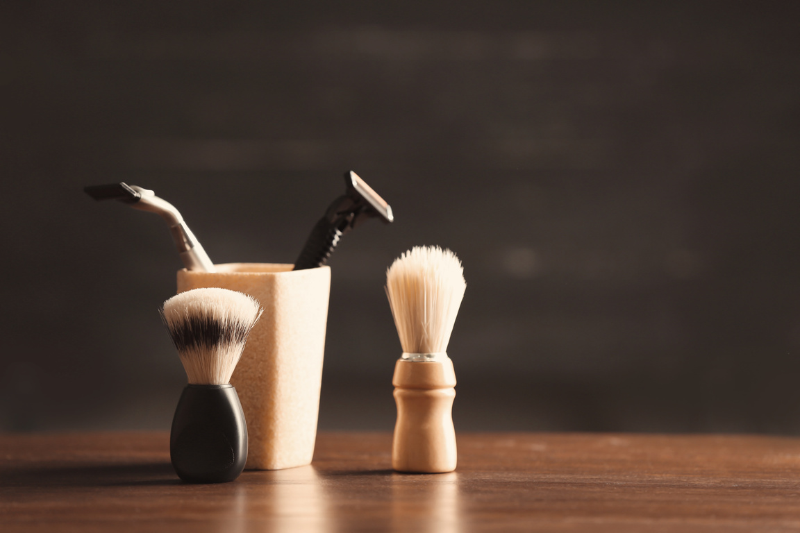 Shaving Accessories for Men on Wooden Table 